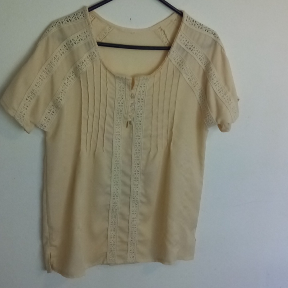 Semi sheer cream colored casual yet elegant top
